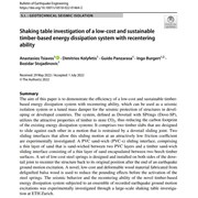 Shaking table investigation of a low-cost and sustainable timber-based energy dissipation system with recentering ability